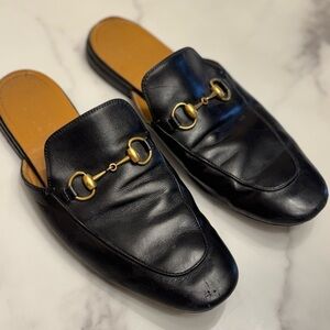 Gucci Black Leather Mules with Gold Detail